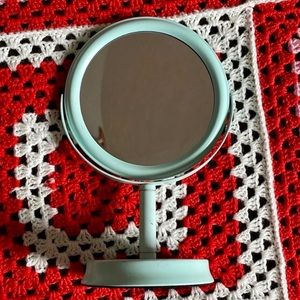 Small blue makeup mirror